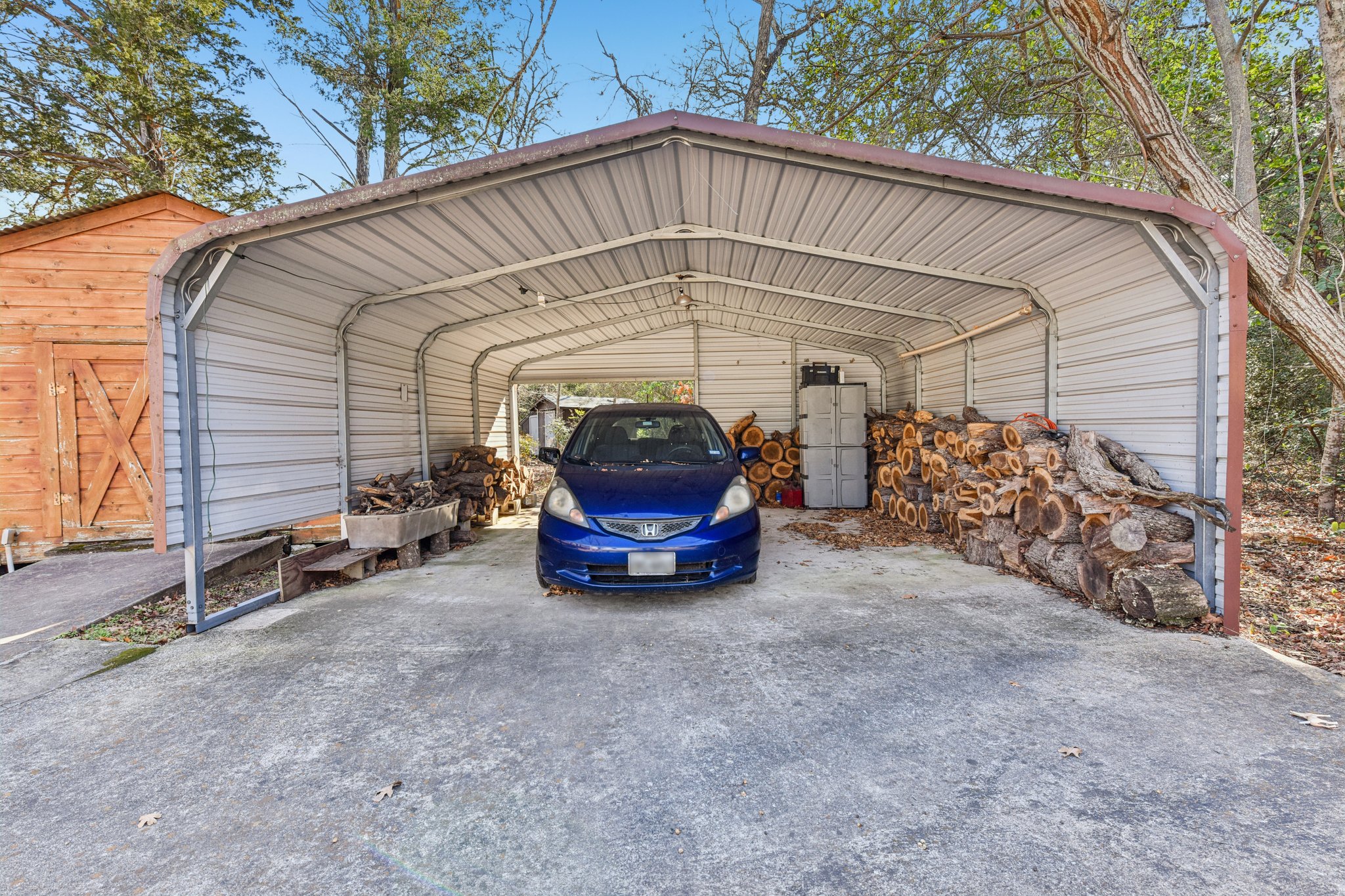 111 Post Oak Lane Elgin, TX 78621 - Photo 24 of 39 And a third carport