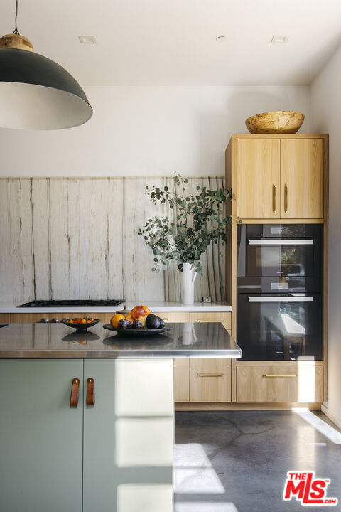 461 West Rustic Road Santa Monica, CA 90402 - Photo 11 of 31 a kitchen with a refrigerator and a stove