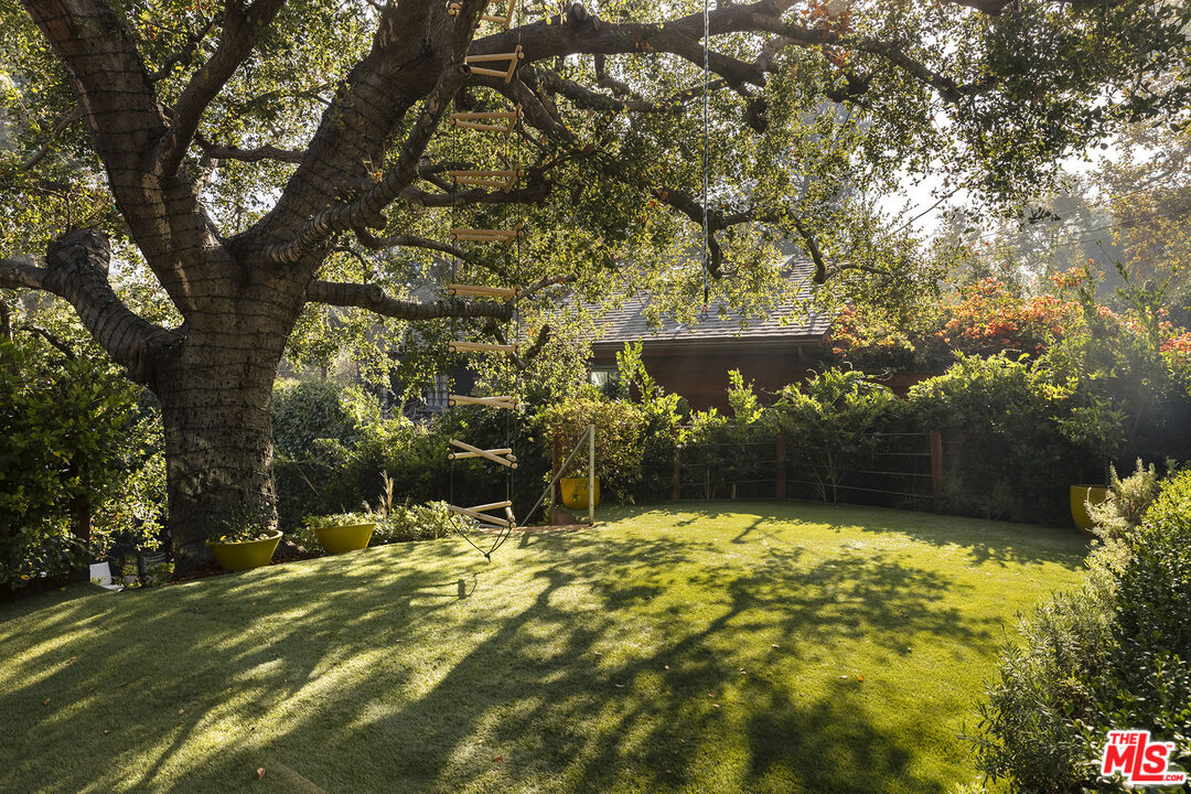 461 West Rustic Road Santa Monica, CA 90402 - Photo 30 of 31 a view of swimming pool with an outdoor space