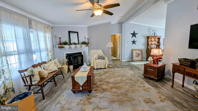 a dining room with furniture and entryway
