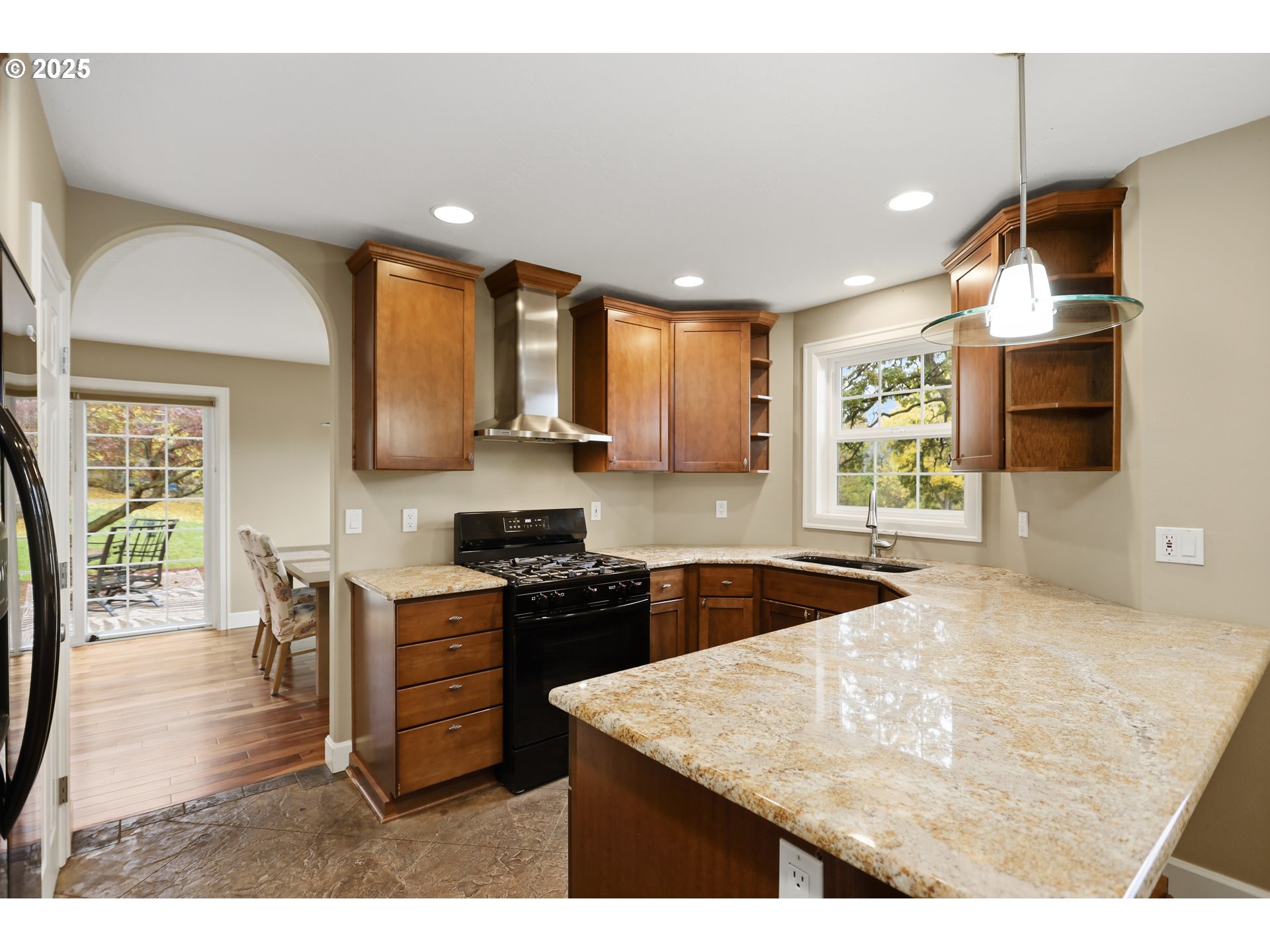 602 Frankton Road Hood River, OR 97031 - Photo 11 of 47 a kitchen with stainless steel appliances granite countertop sink stove top oven and cabinets