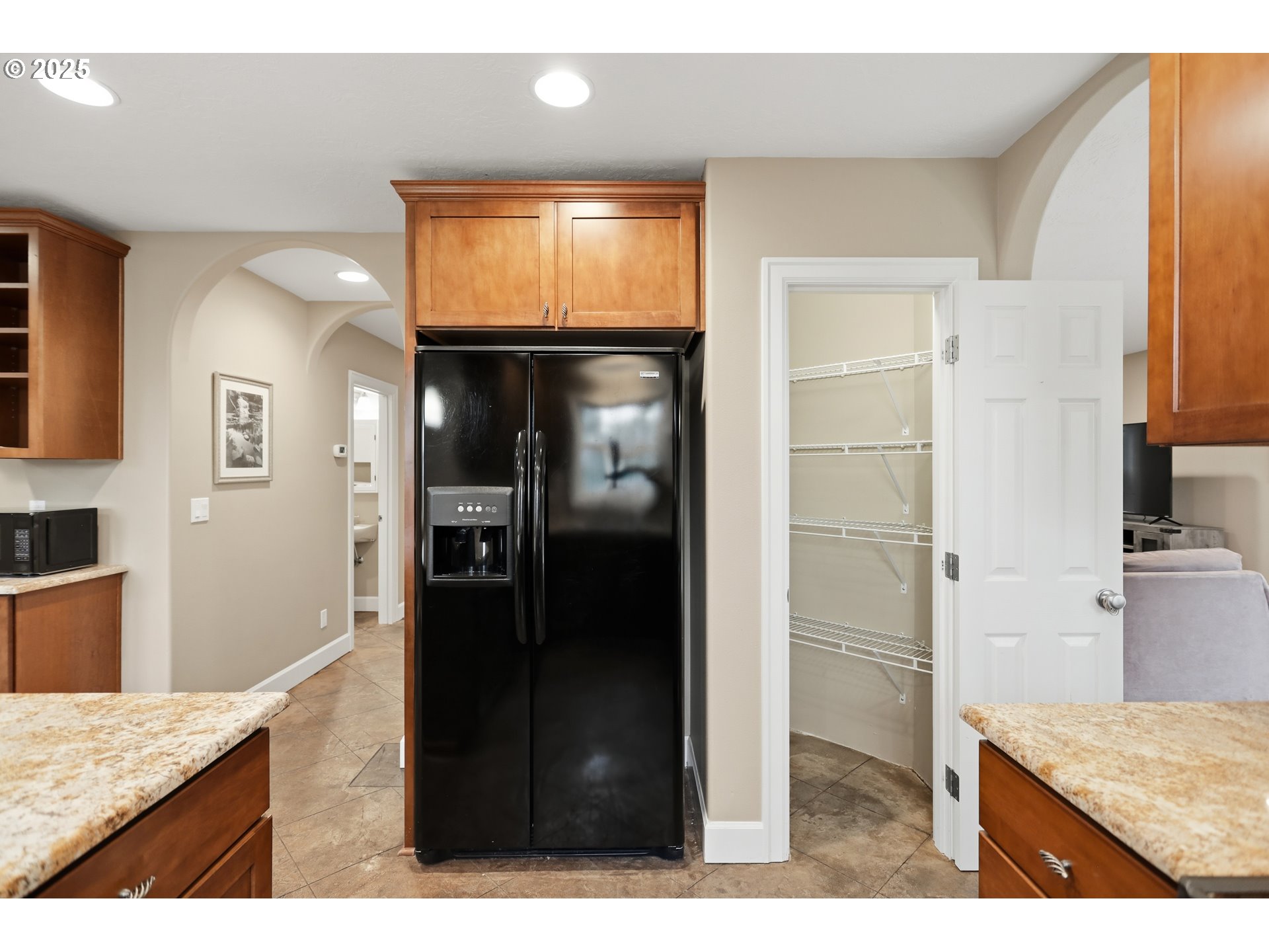 602 Frankton Road Hood River, OR 97031 - Photo 16 of 47 a kitchen view with granite countertop a refrigerator and a sink