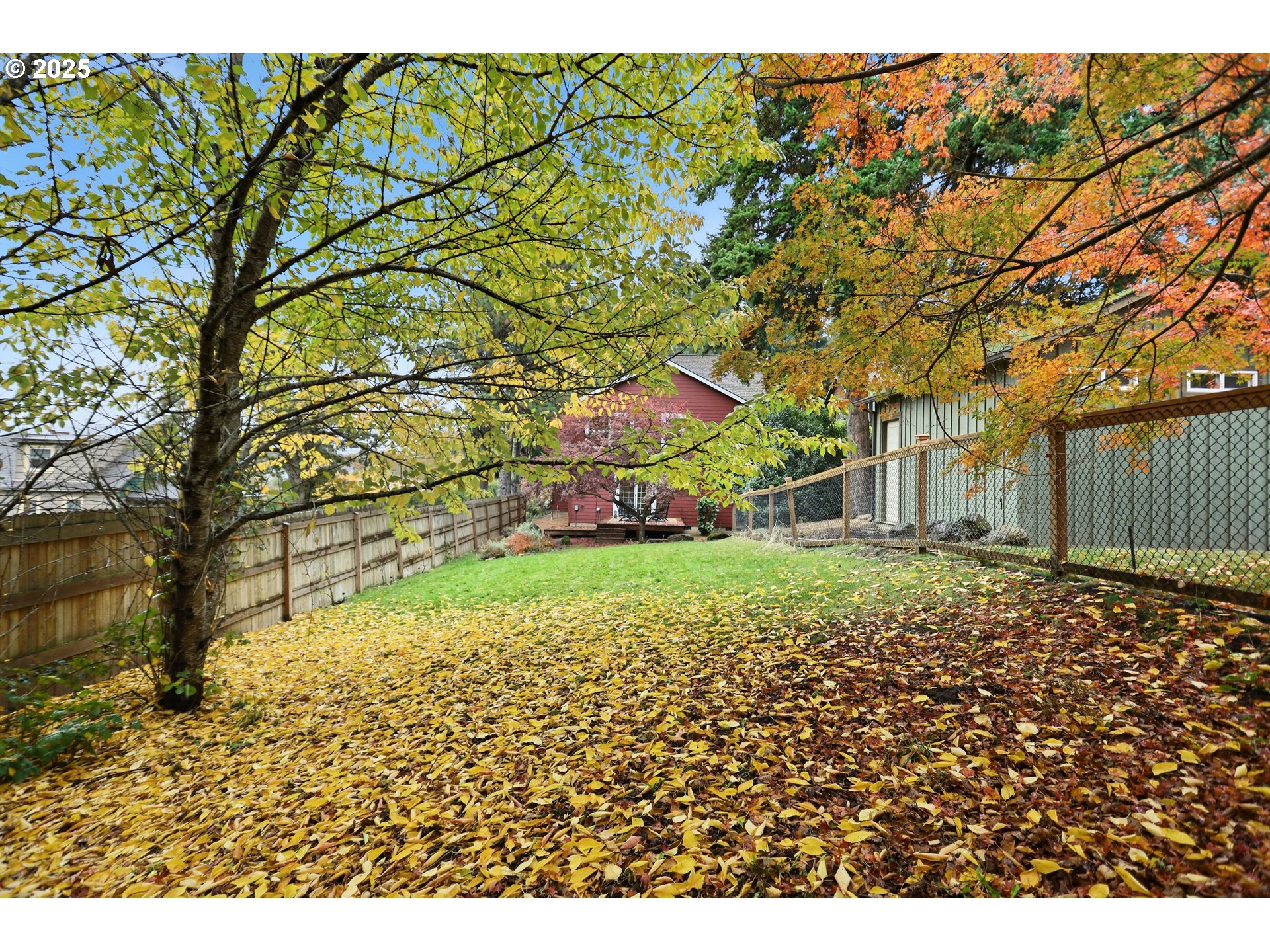 602 Frankton Road Hood River, OR 97031 - Photo 42 of 47 a view of a yard with plants and wooden fence