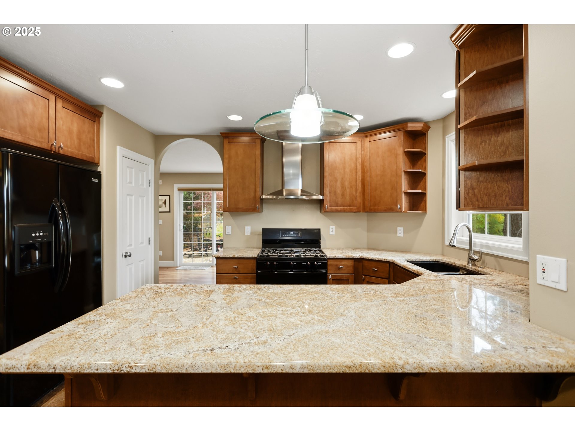602 Frankton Road Hood River, OR 97031 - Photo 10 of 47 a kitchen with a stove a refrigerator and a sink