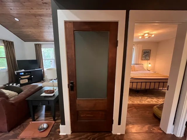 a bathroom with a sink mirror toilet and bathtub
