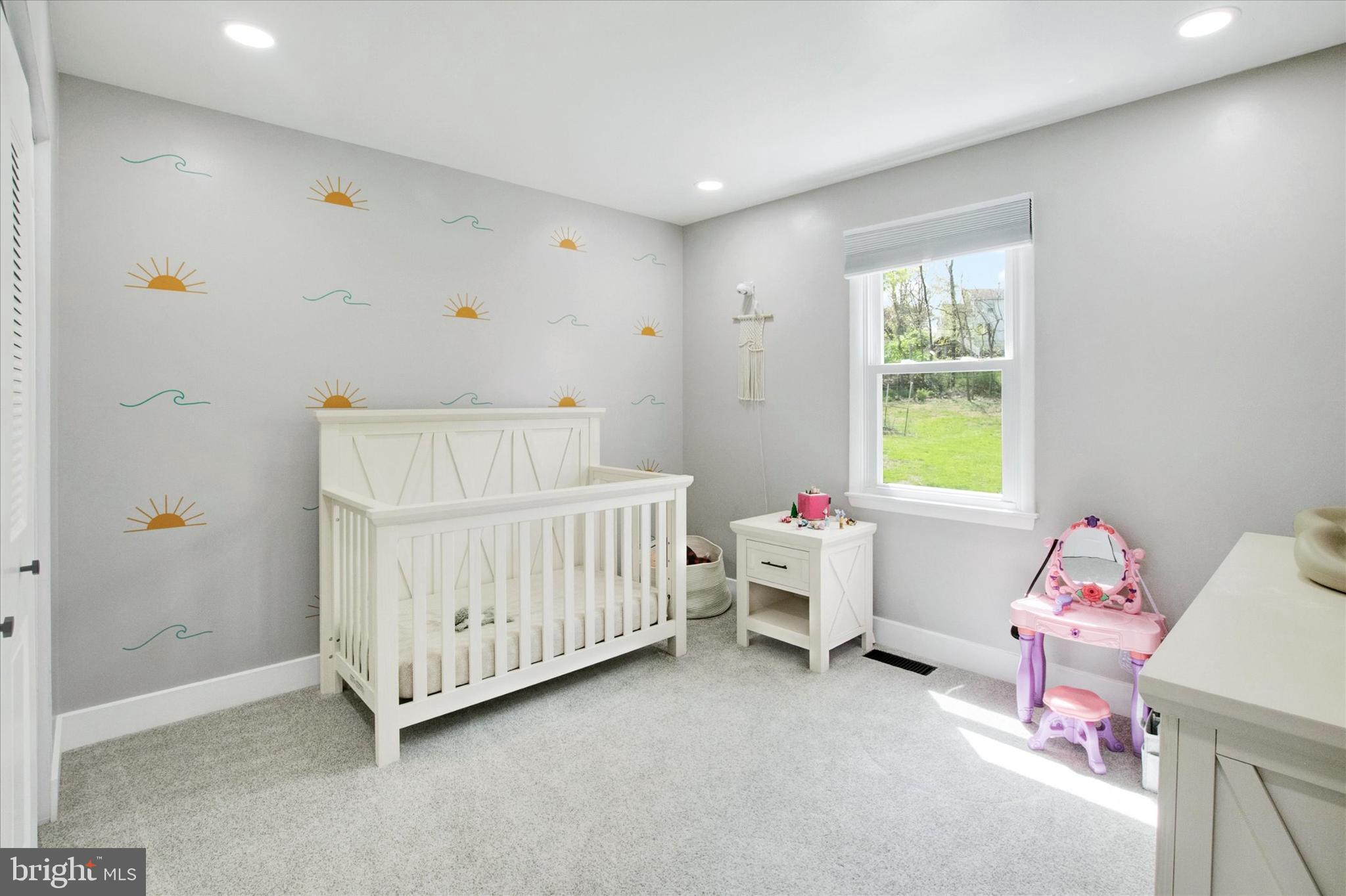 237 Bridge Road Upper Chichester, PA 19061 - Photo 20 of 27 a bedroom with a bed and a window