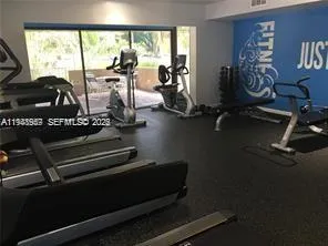 a swimming pool with outdoor seating and yard