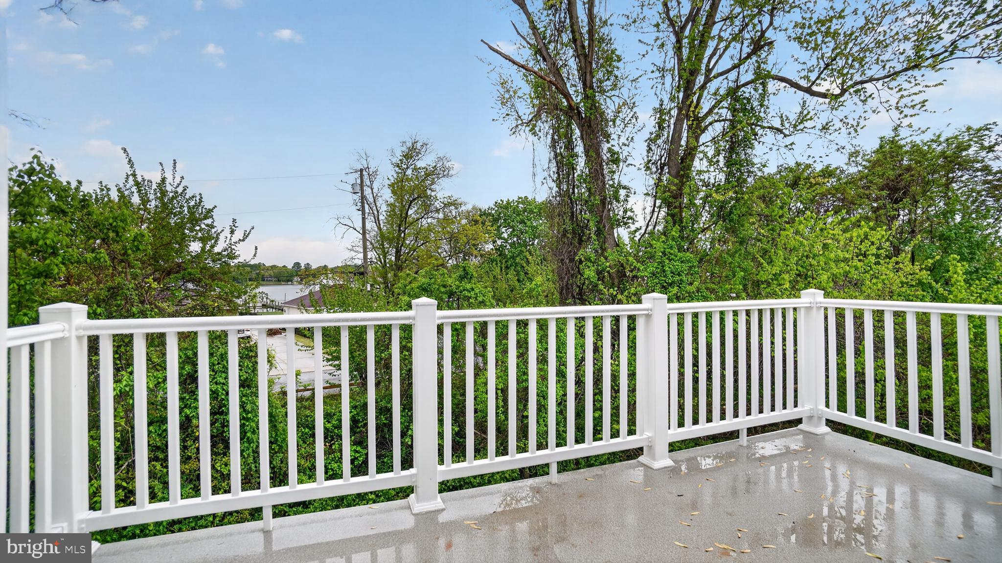 2001 Poplar Ridge Road Pasadena, MD 21122 - Photo 55 of 83 a balcony with wooden floor and fence