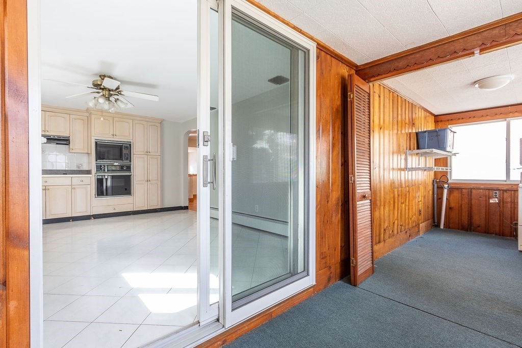 32 Duncan Road Everett, MA 02149 - Photo 17 of 30 a view of a bathroom with a glass door shower