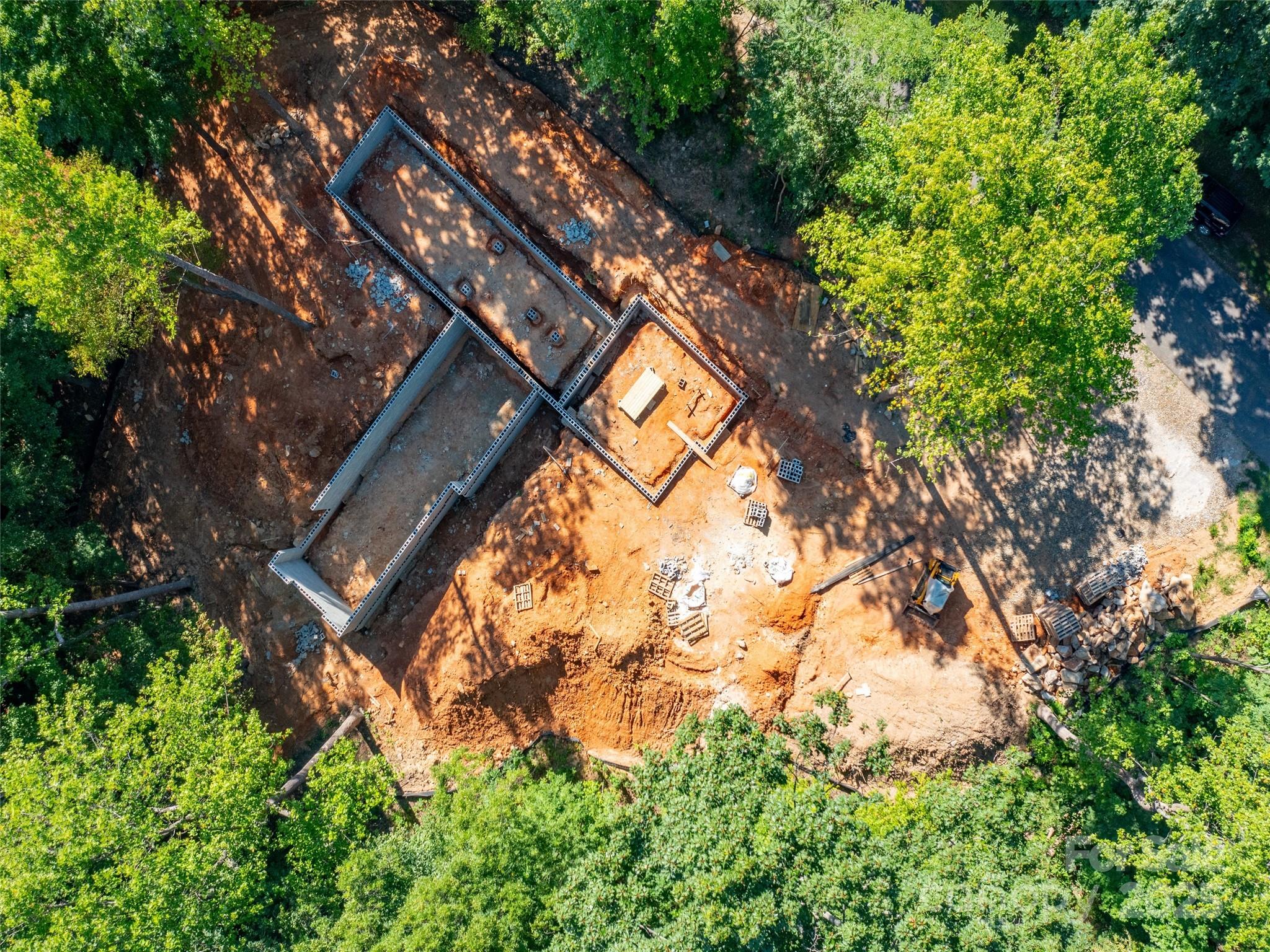 2140 Harm Creek Loop Mill Spring Mill Spring, NC 28756 - Photo 14 of 29 a backyard of a house with lots of green space