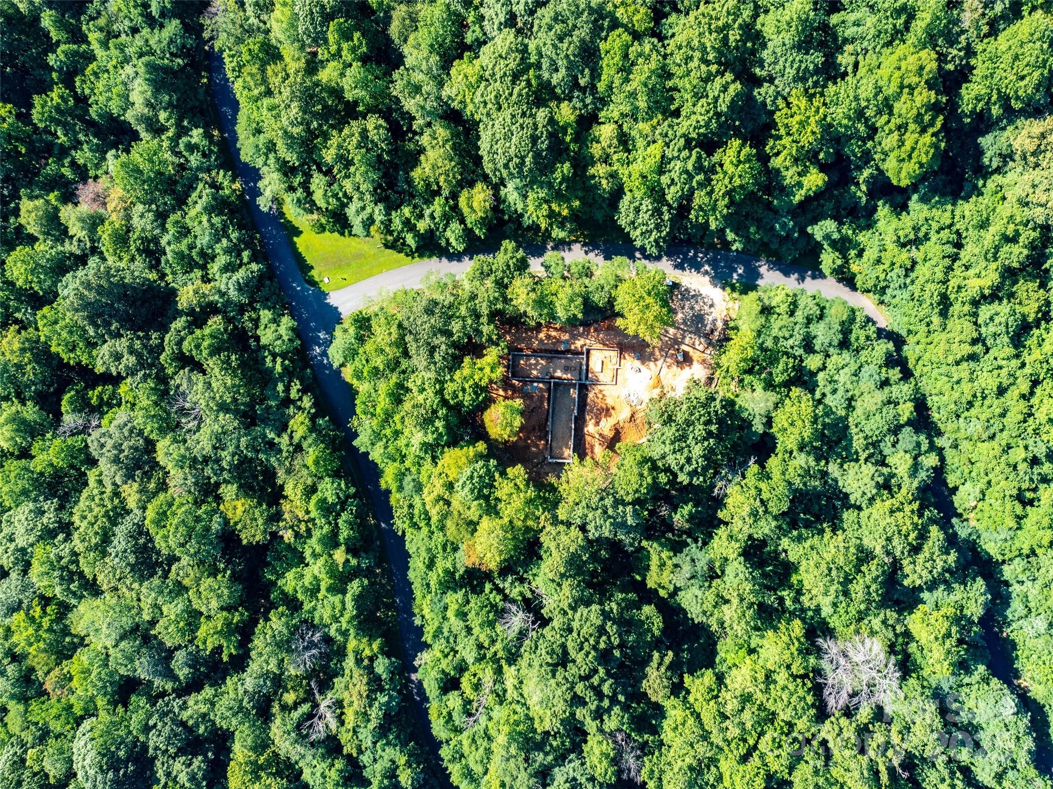 2140 Harm Creek Loop Mill Spring Mill Spring, NC 28756 - Photo 18 of 29 a view of a garden