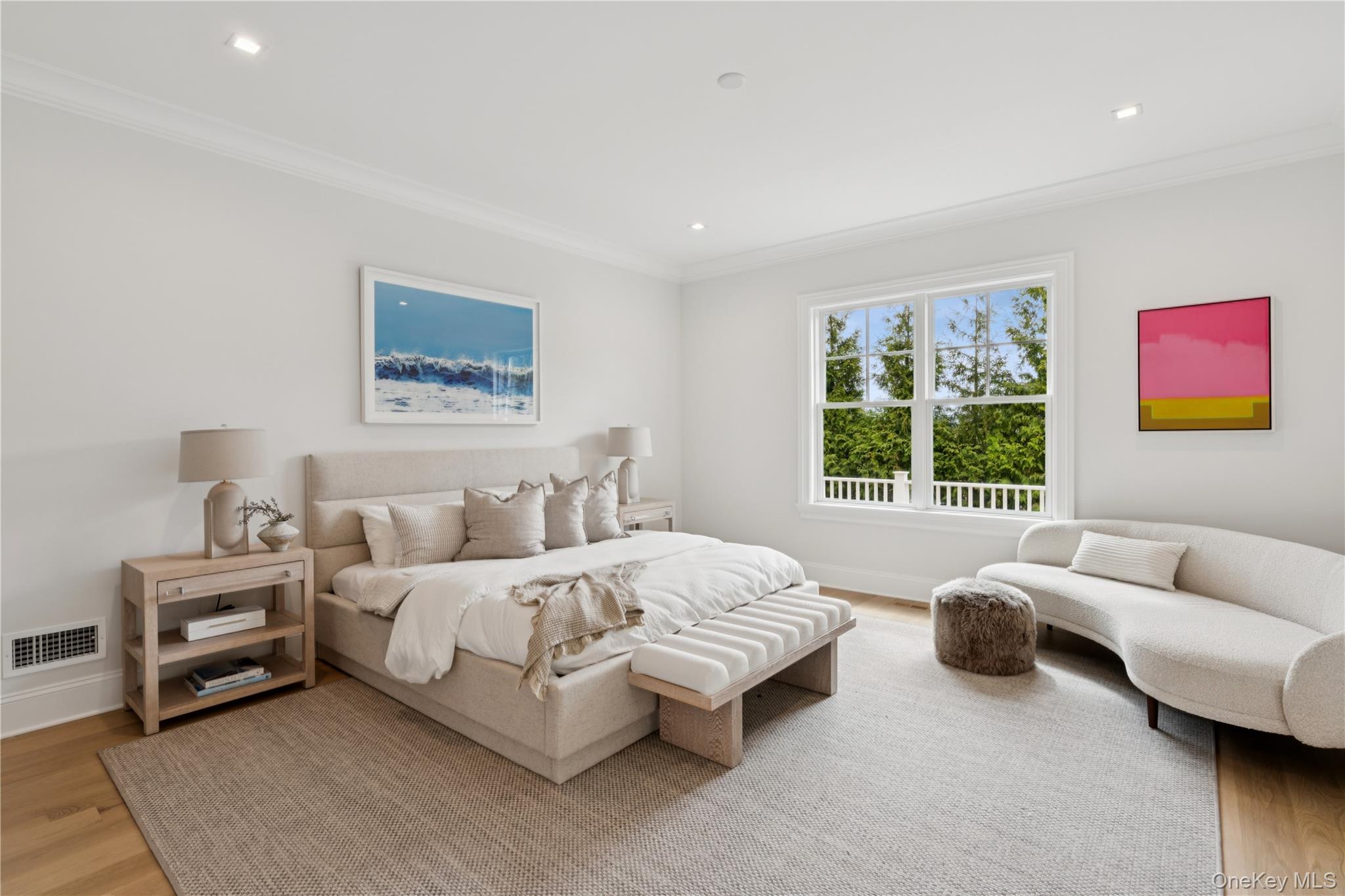 450 7 Ponds Towd Road Water Mill, NY 11976 - Photo 12 of 32 a spacious bedroom with a bed and a couch