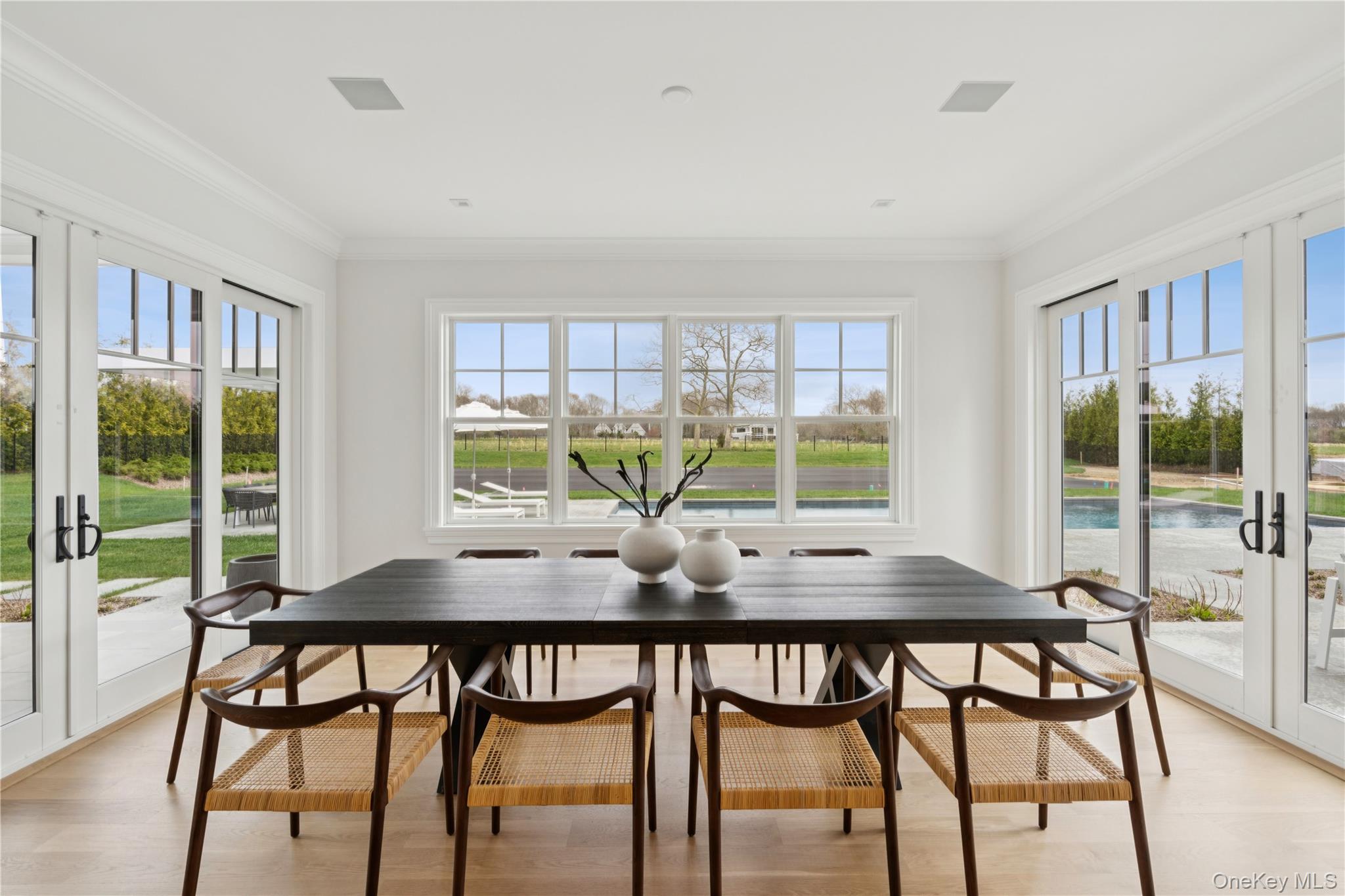 450 7 Ponds Towd Road Water Mill, NY 11976 - Photo 7 of 32 a view of a dining room with furniture window and outside view