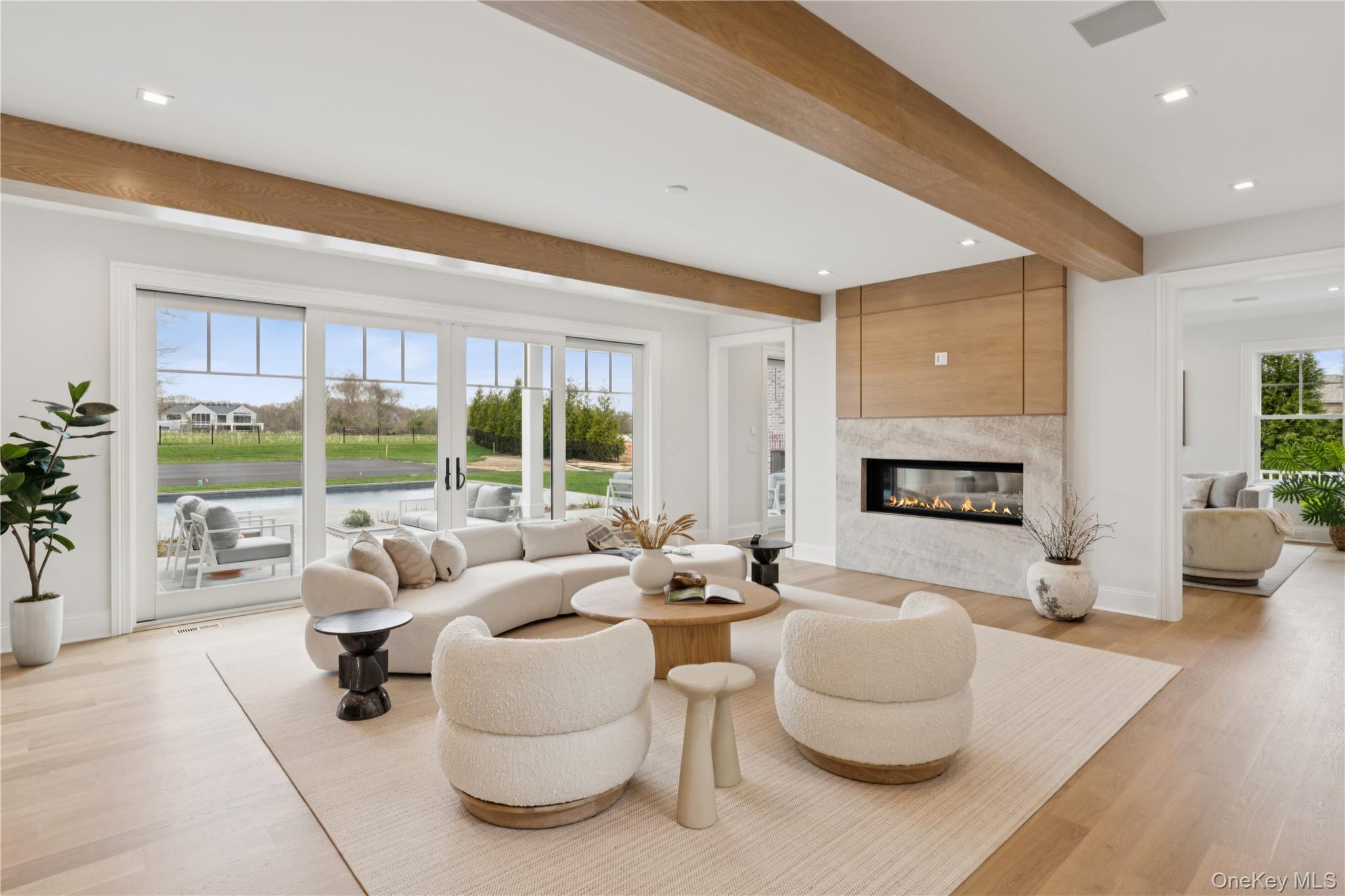 450 7 Ponds Towd Road Water Mill, NY 11976 - Photo 8 of 32 a living room with furniture and a large window