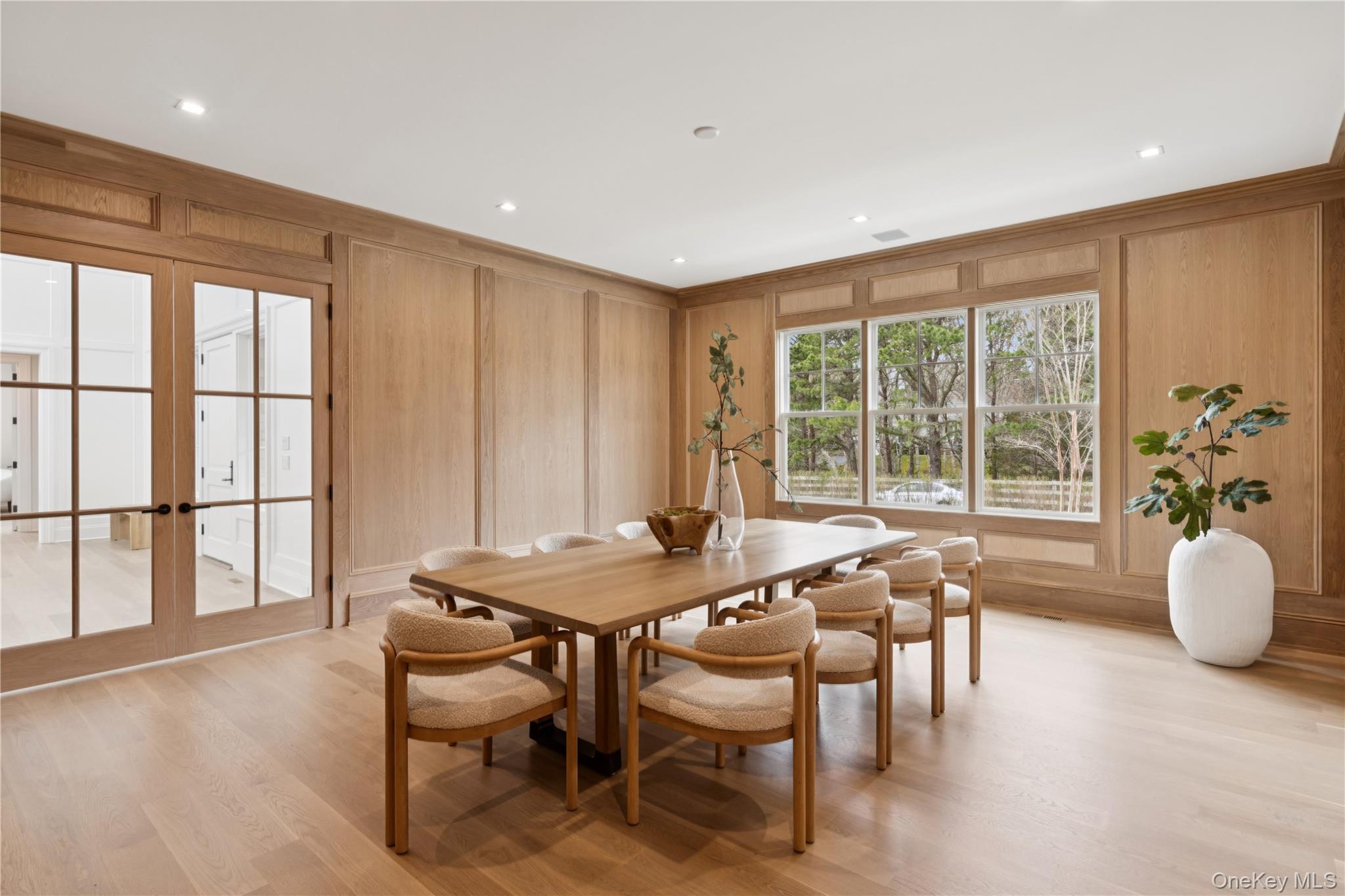 450 7 Ponds Towd Road Water Mill, NY 11976 - Photo 10 of 32 a dining room with furniture and wooden floor