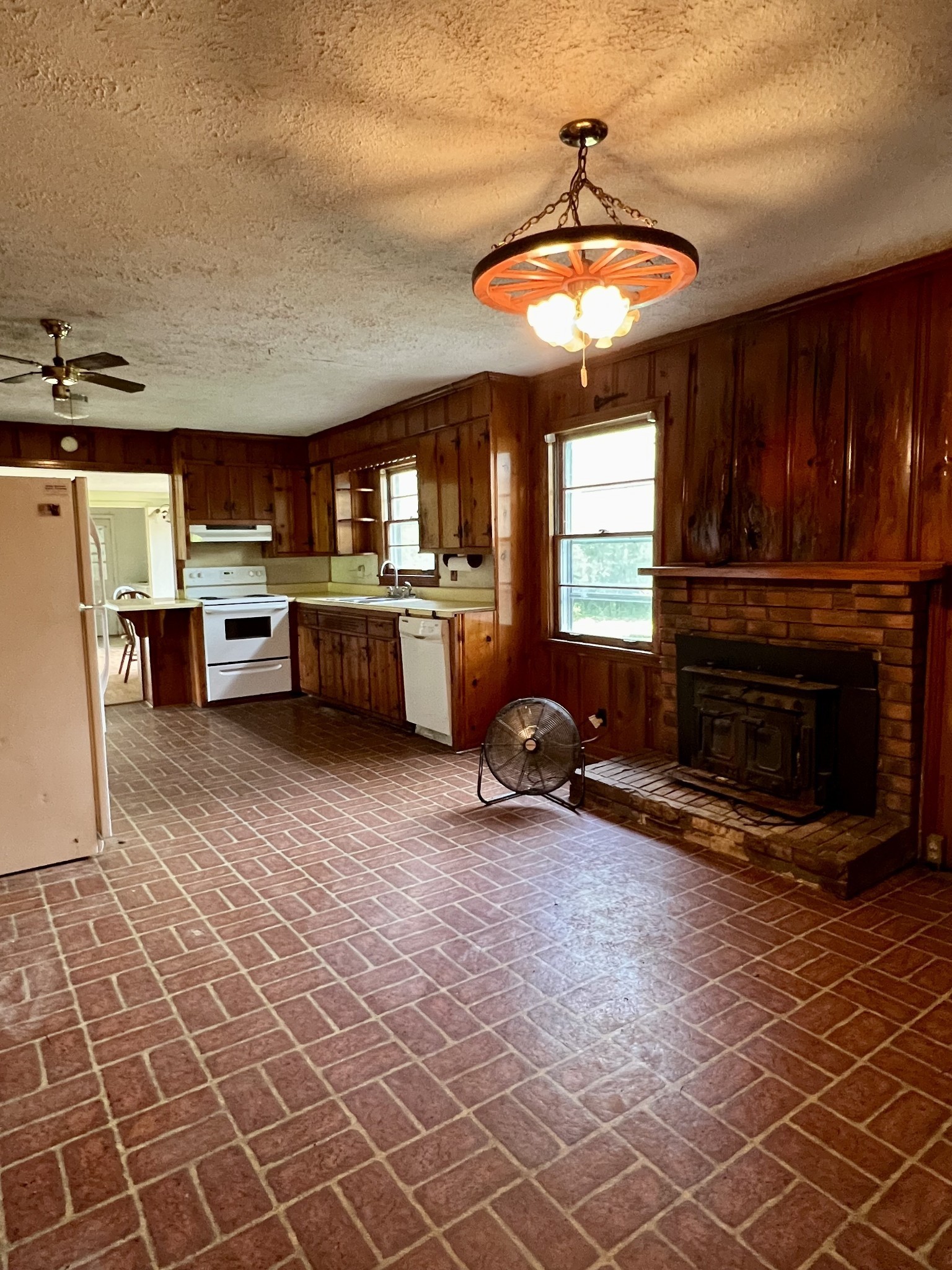 250 Chipman Road Bethpage, TN 37022 - Photo 20 of 32 a kitchen with stainless steel appliances a stove a sink dishwasher and cabinets