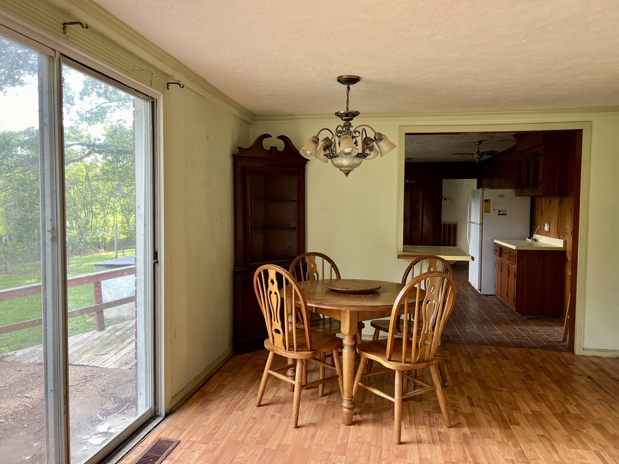 250 Chipman Road Bethpage, TN 37022 - Photo 5 of 32 a view of a dining room with furniture wooden floor and chandelier
