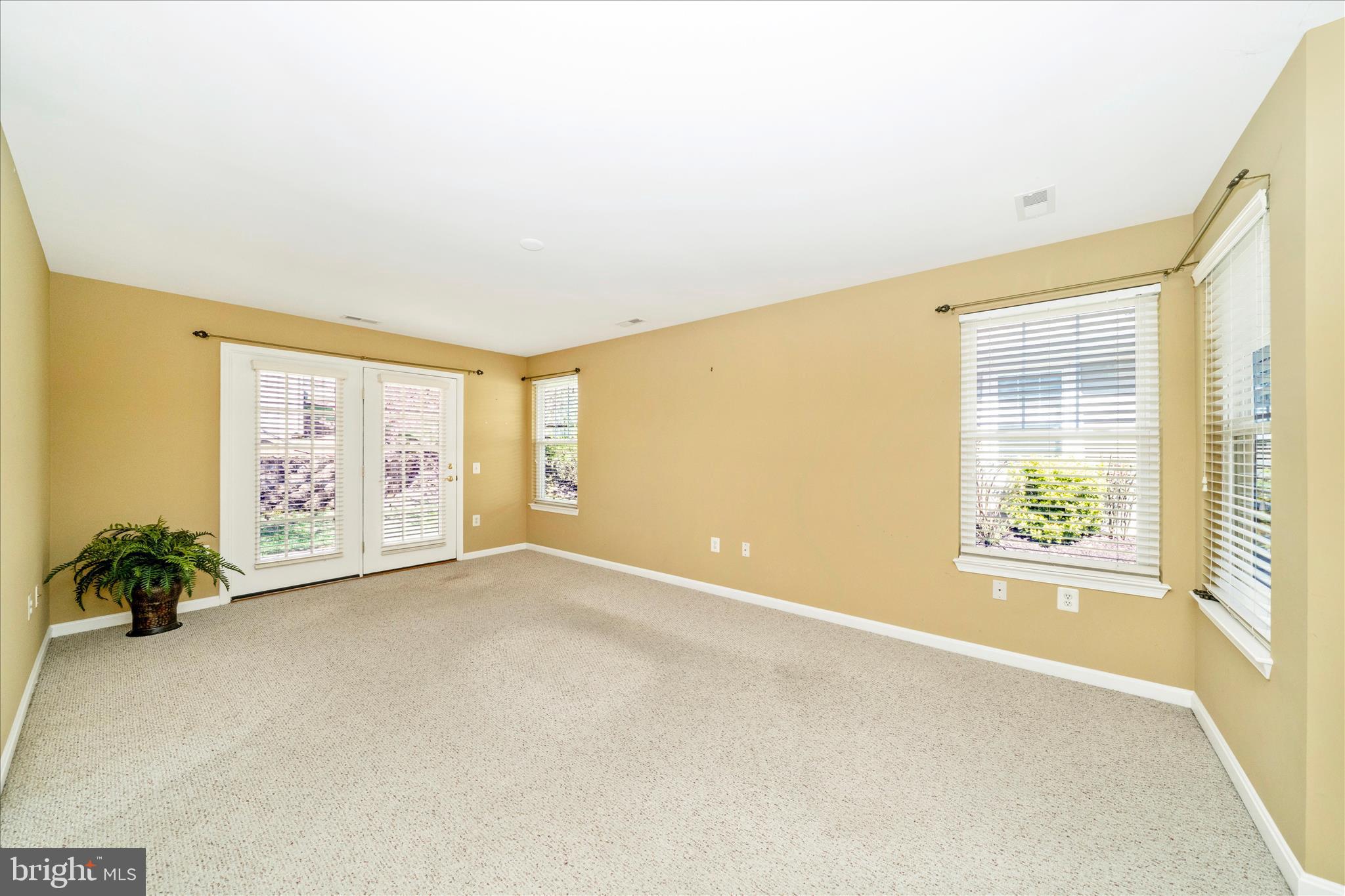 908 Roller Coaster Court Mount Airy, MD 21771 - Photo 10 of 69 an empty room with windows