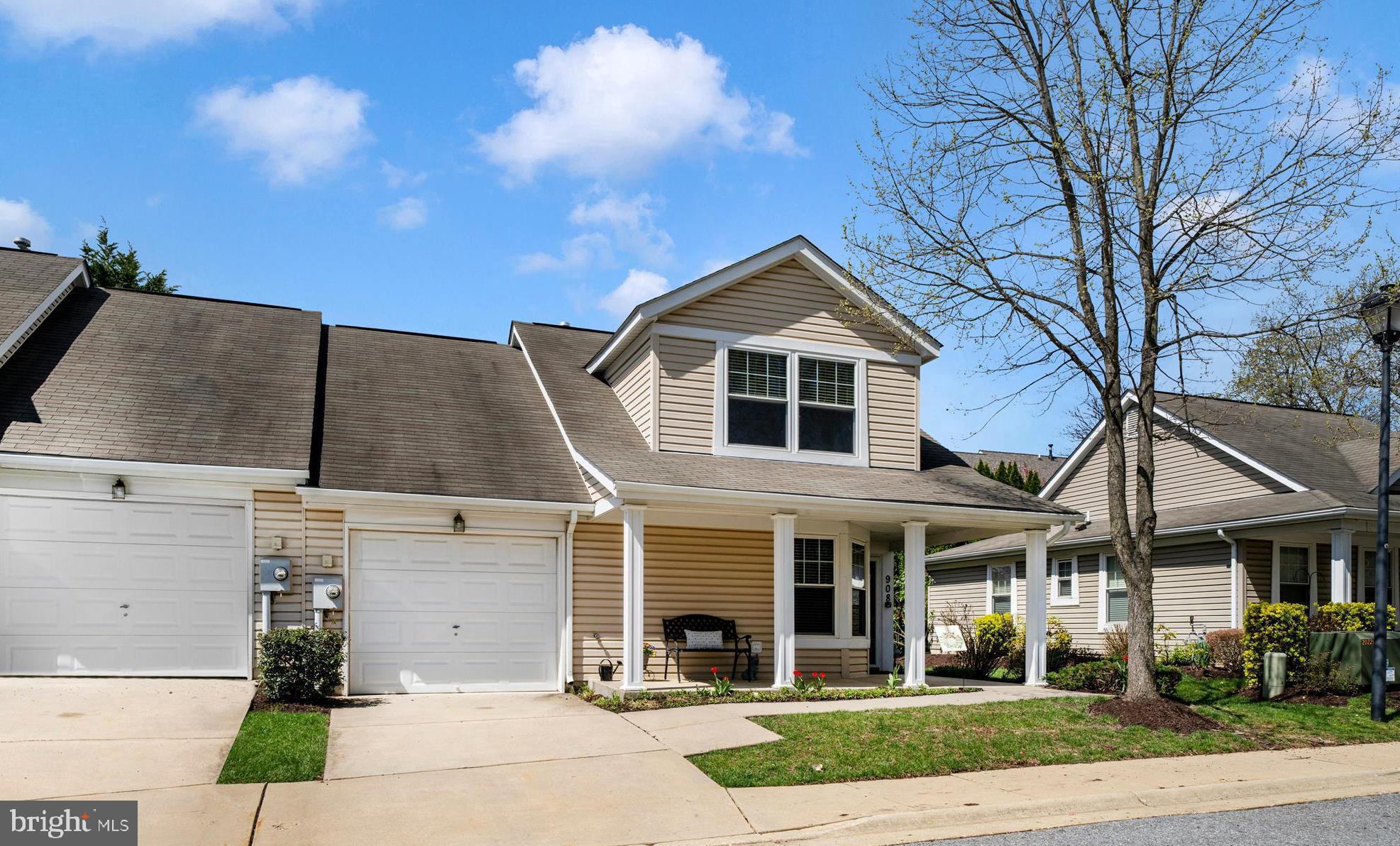 908 Roller Coaster Court Mount Airy, MD 21771 - Photo 2 of 69 a front view of a house with a yard