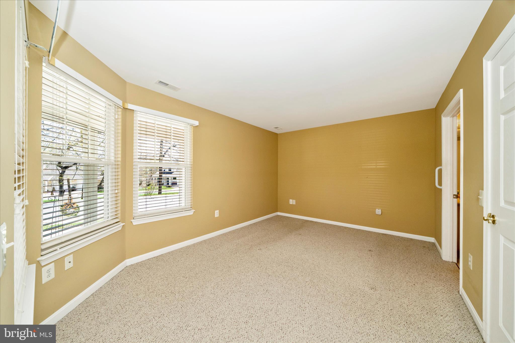 908 Roller Coaster Court Mount Airy, MD 21771 - Photo 21 of 69 a view of an empty room with a window