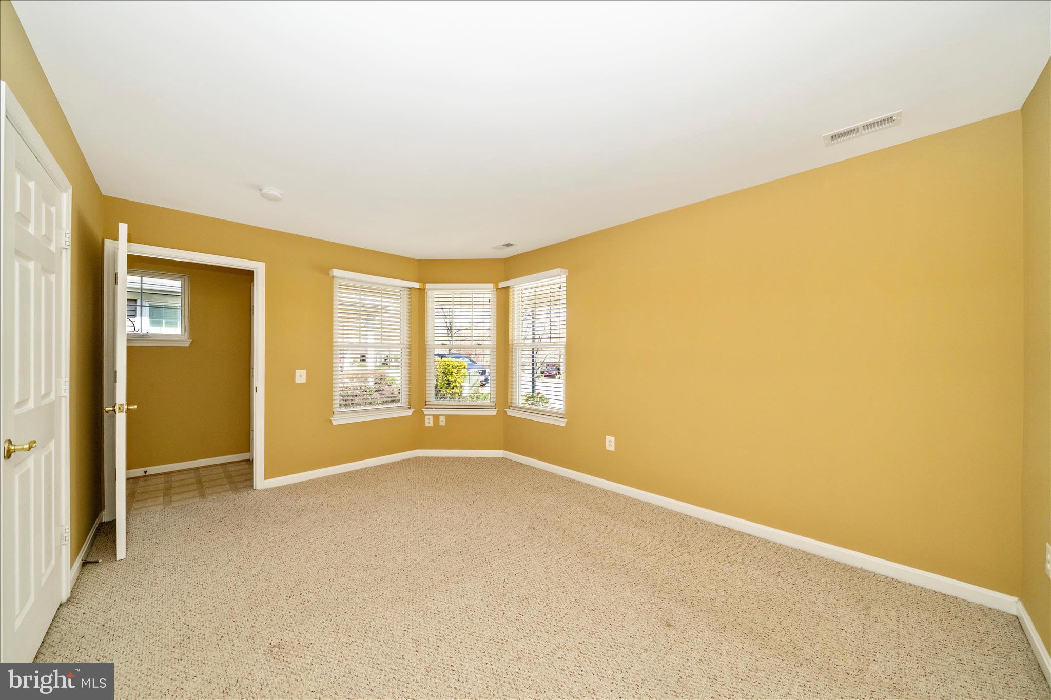 908 Roller Coaster Court Mount Airy, MD 21771 - Photo 24 of 69 an empty room with windows