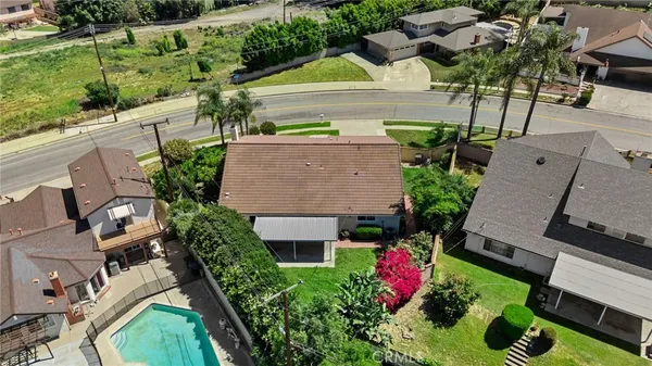 an aerial view of house with yard