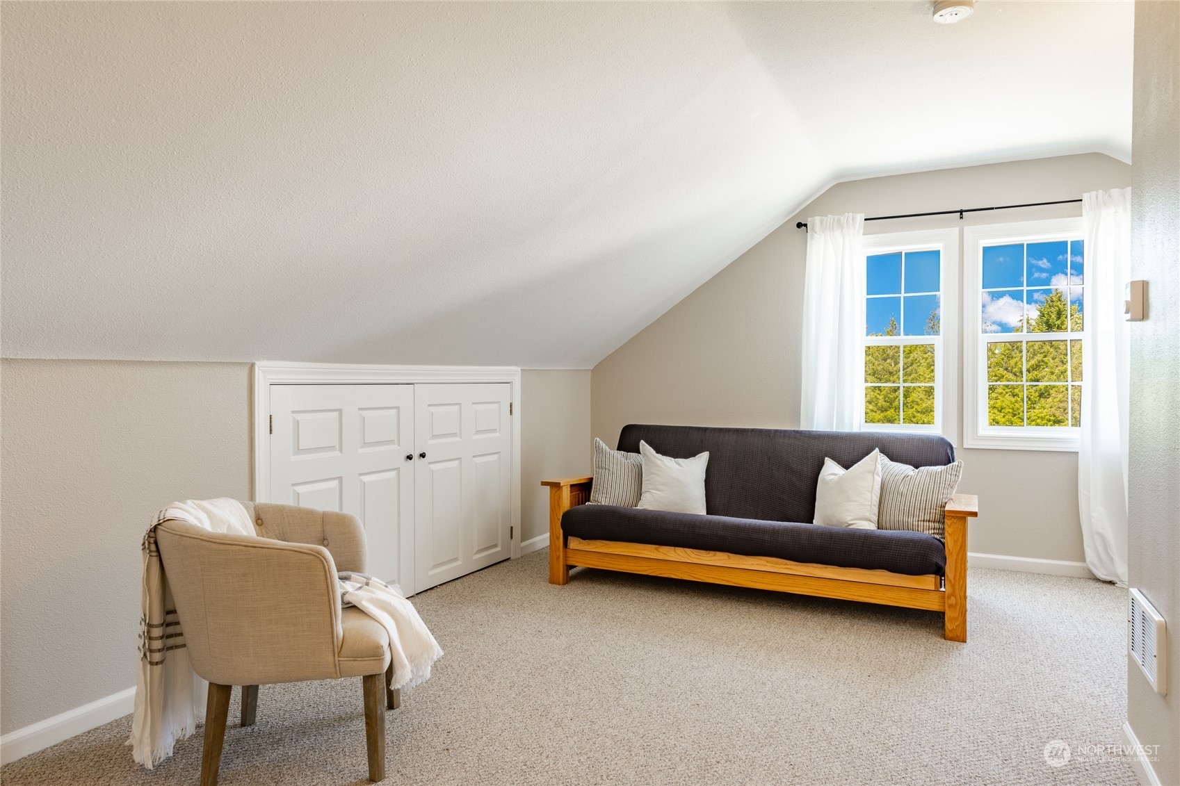 6708 Woodlyn Road Ferndale, WA 98248 - Photo 25 of 40 a bedroom with furniture and a window