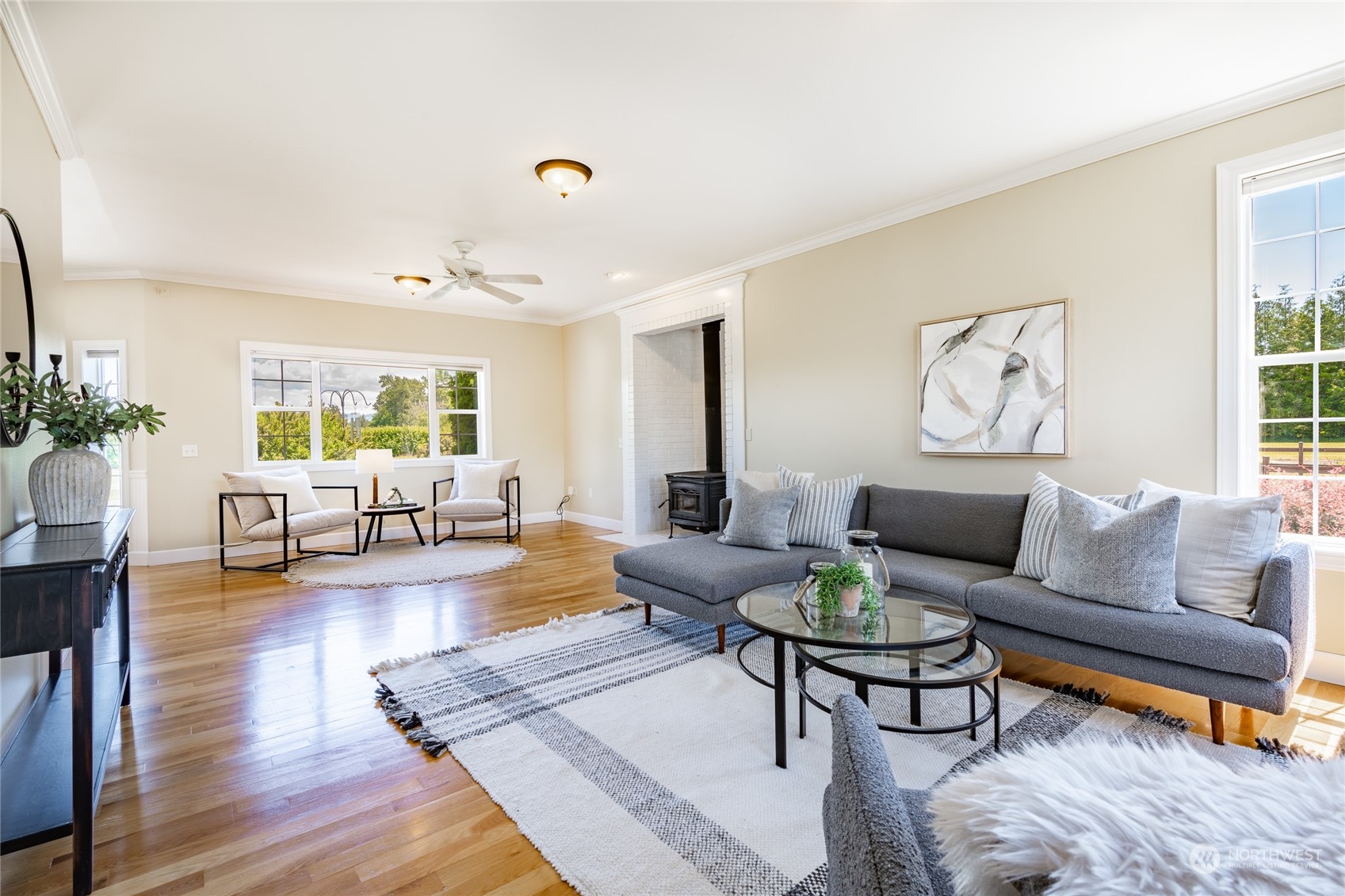 6708 Woodlyn Road Ferndale, WA 98248 - Photo 10 of 40 a living room with furniture and wooden floor