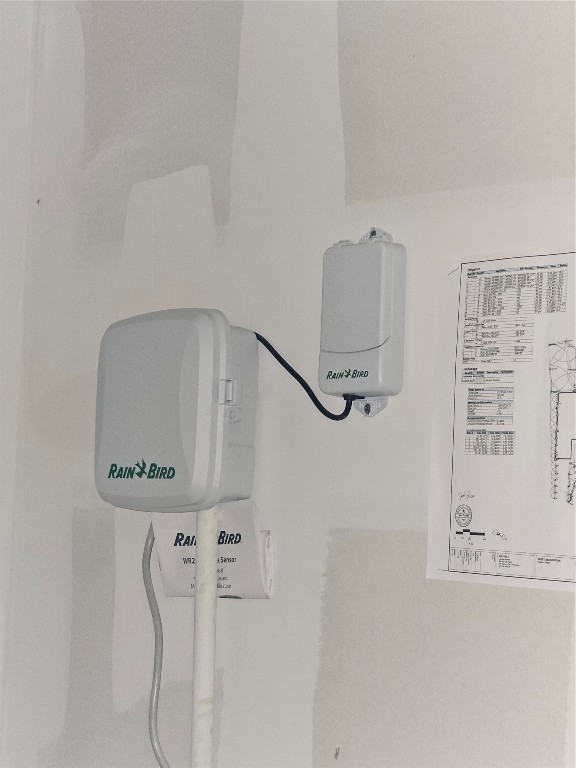 856 Rancho Del Cielo Loop Jarrell, TX 76537 - Photo 31 of 35 a bathroom with a mirror and a shower