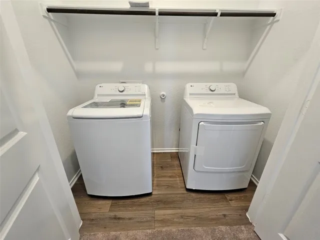 a utility room with dryer and washer