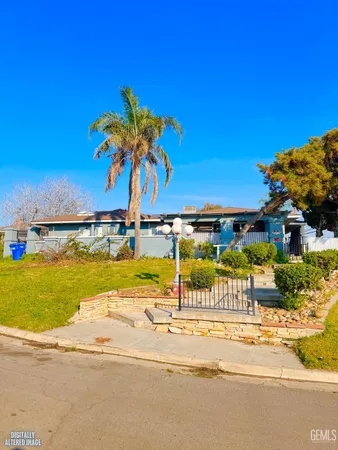 a view of a swimming pool and an outdoor space