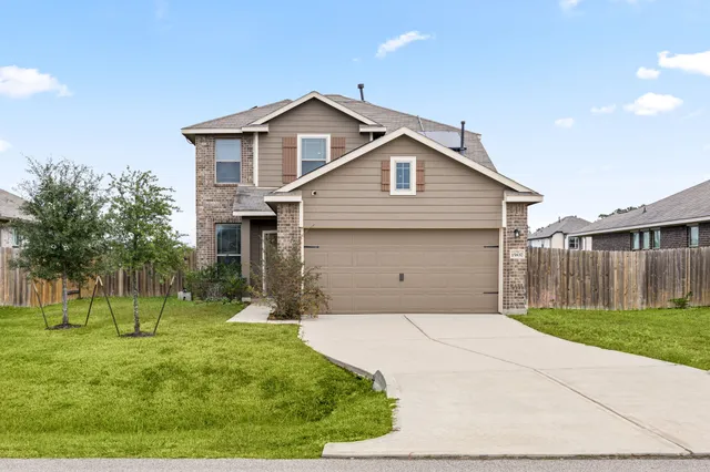 a house view with a garden space