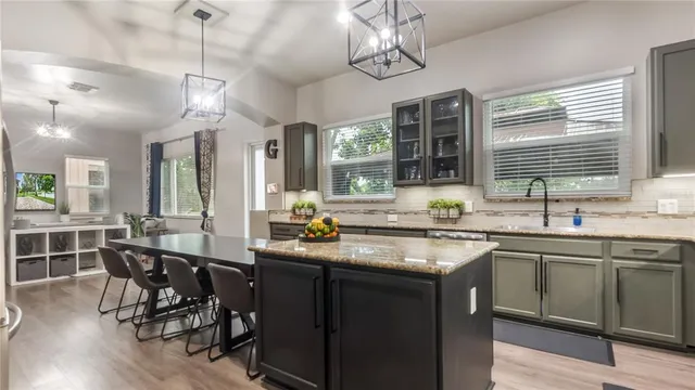 a view of a room with furniture window and wooden floor