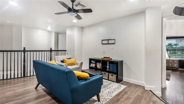 a view of a workspace with furniture