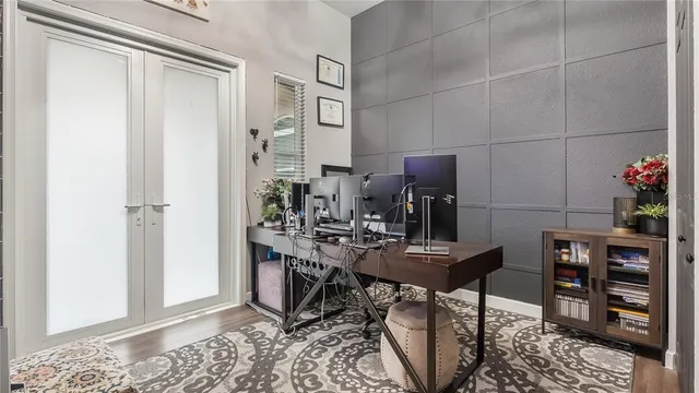 a white toilet sitting next to a bathroom sink