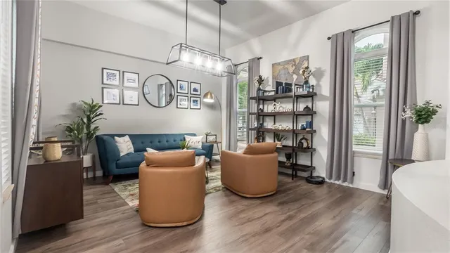 a work room with furniture and wooden floor