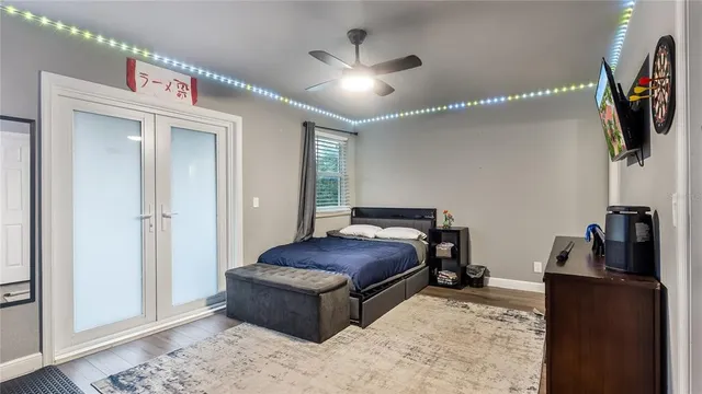 a view of a patio with a table chairs and a backyard