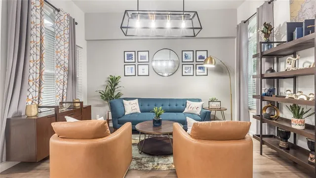a view of a living room and dining room