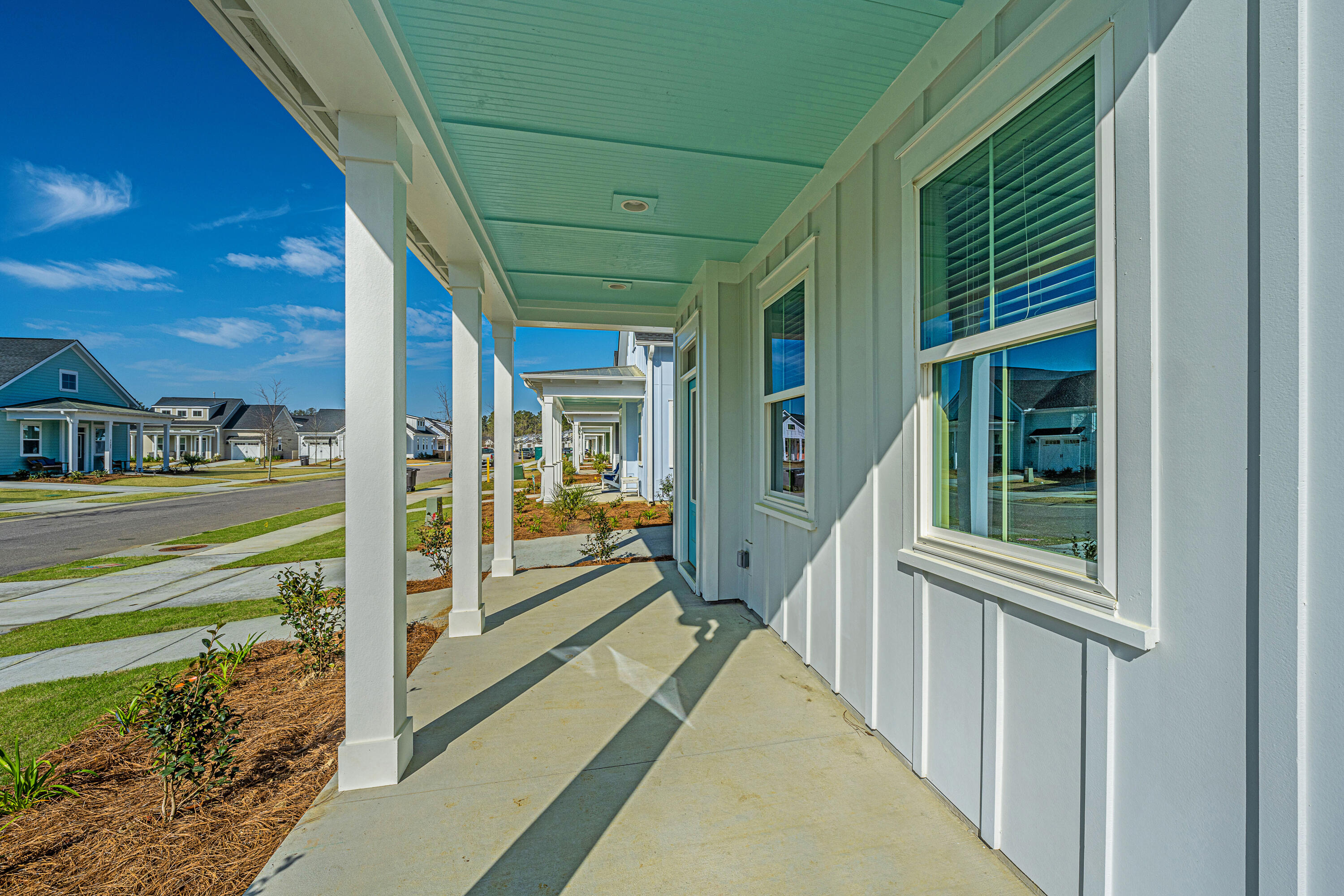 3528 Habenaria Road, Unit 24 Mount Pleasant, SC 29466 - Photo 7 of 33 Front covered porch
