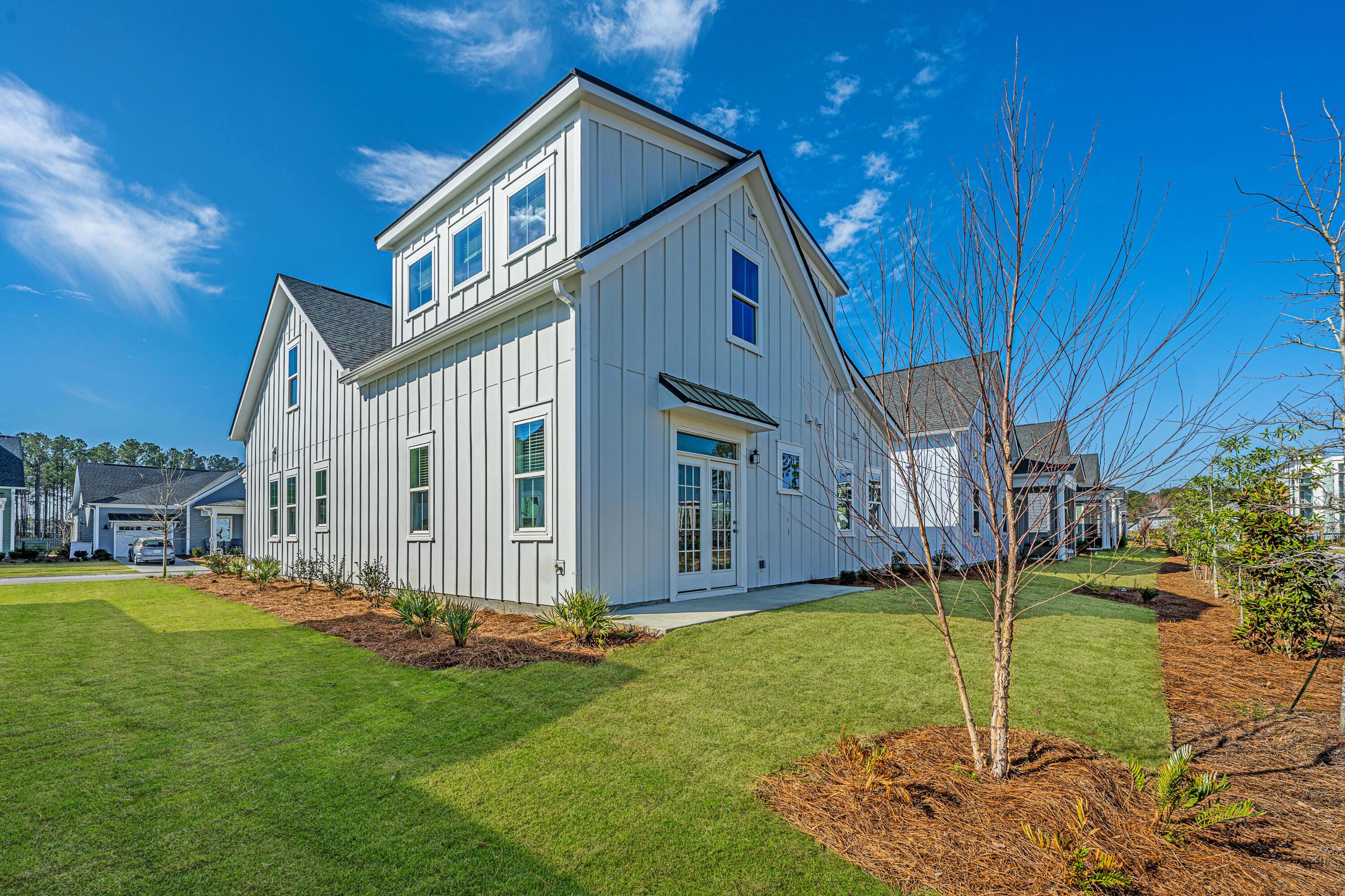 3528 Habenaria Road, Unit 24 Mount Pleasant, SC 29466 - Photo 8 of 33 Back view of home