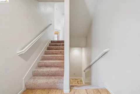 a view of staircase with white walls and white walls