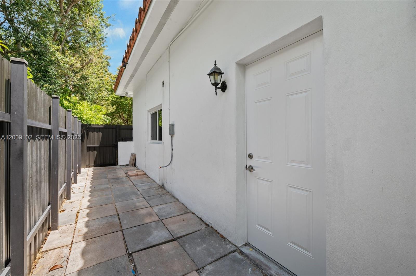 330 Southwest 27th Road Miami, FL 33129 - Photo 29 of 62 a view of a house with a backyard