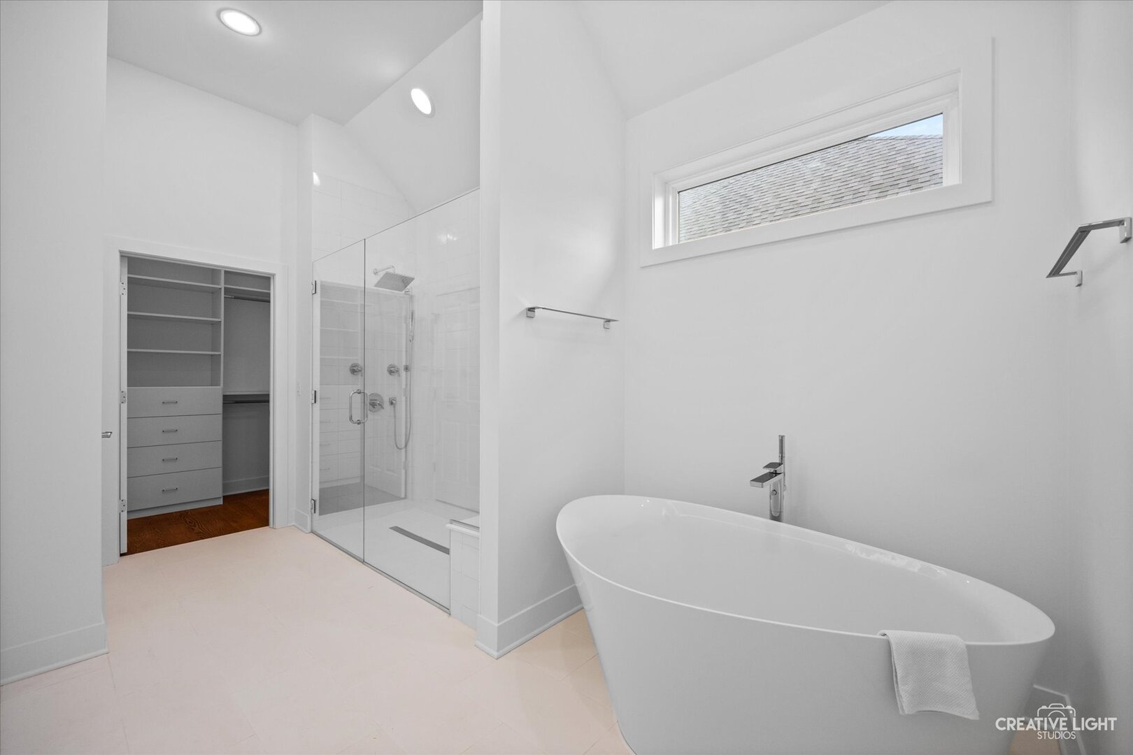 7625 Dunham Road Woodridge, IL 60517 - Photo 17 of 25 a bathroom with a bathtub and a shower