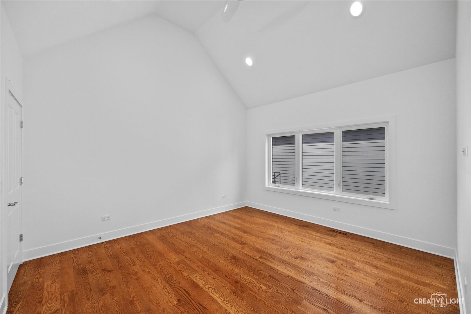 7625 Dunham Road Woodridge, IL 60517 - Photo 18 of 25 a view of an empty room with a window