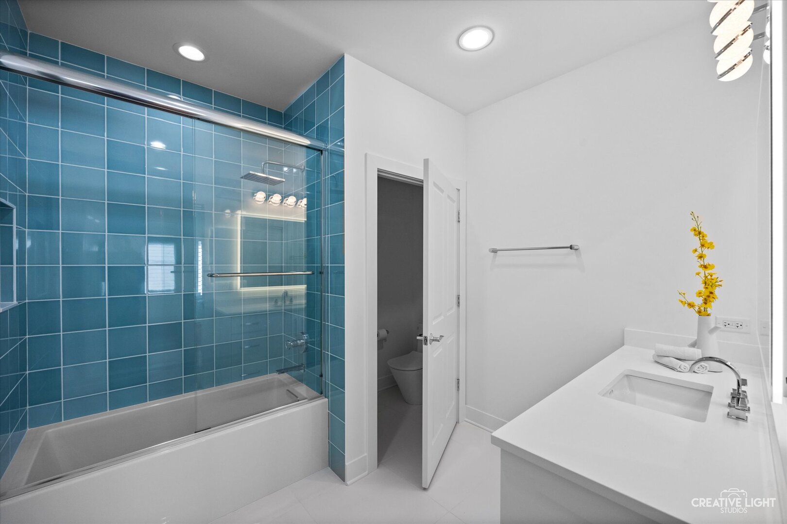 7625 Dunham Road Woodridge, IL 60517 - Photo 20 of 25 a bathroom with a bathtub a sink and a shower