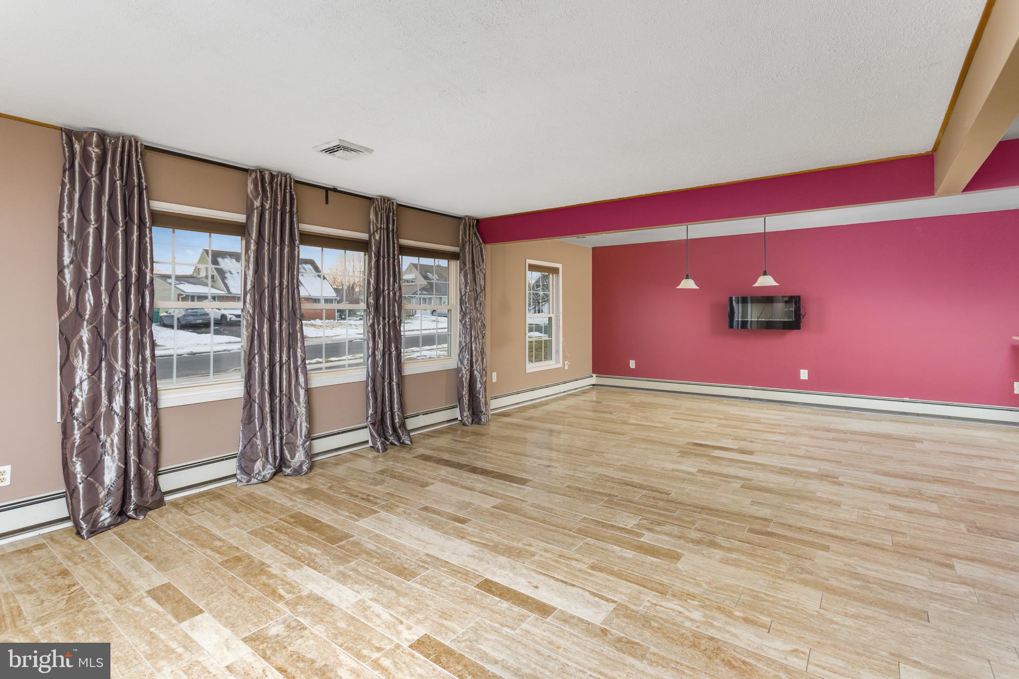 90 Cobalt Ridge Drive East, Unit E Levittown, PA 19057 - Photo 27 of 27 Living Room/Dining Room Open Floor Plan