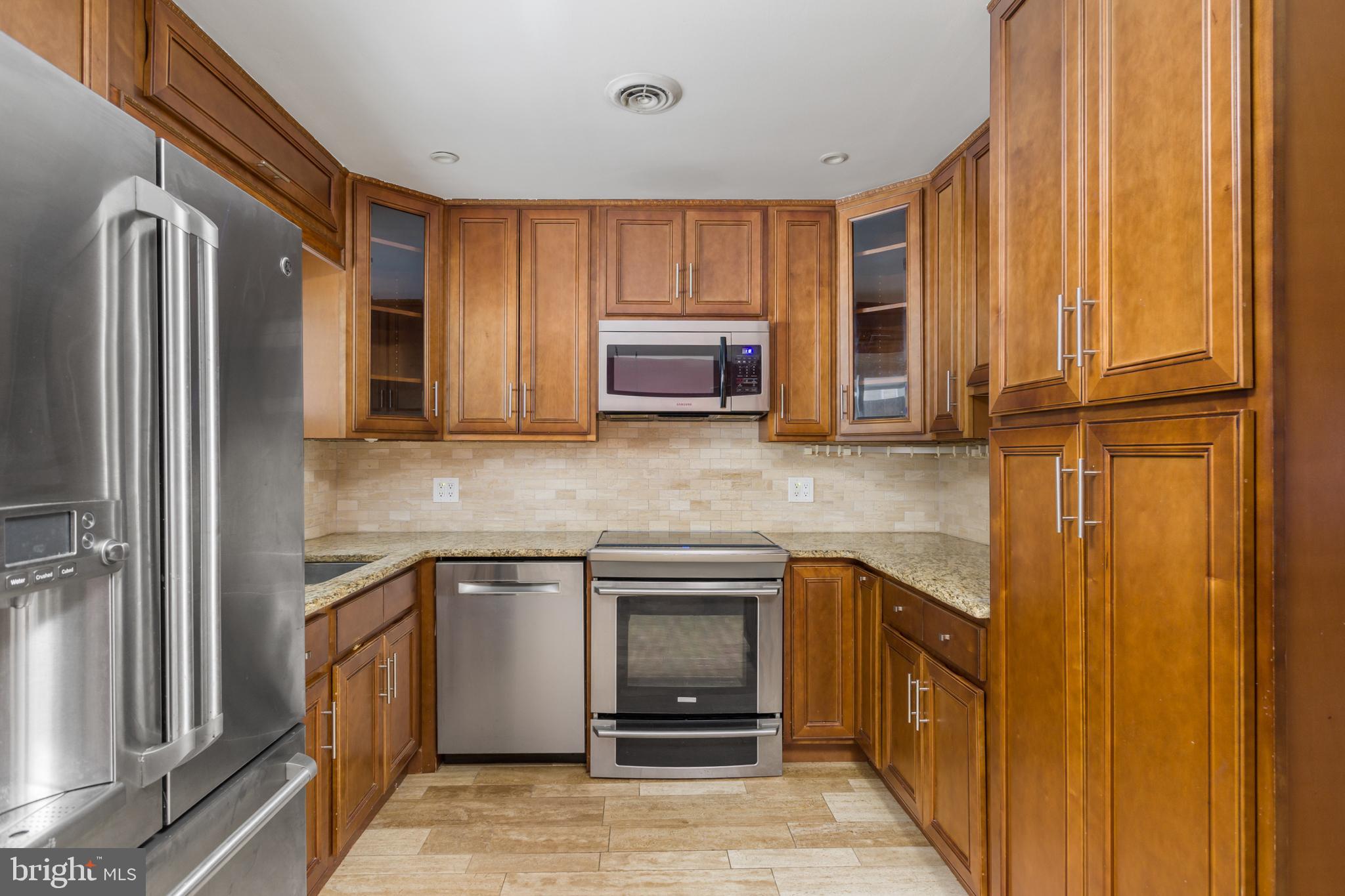 90 Cobalt Ridge Drive East, Unit E Levittown, PA 19057 - Photo 8 of 27 Kitchen - Stainless Steele Appliances