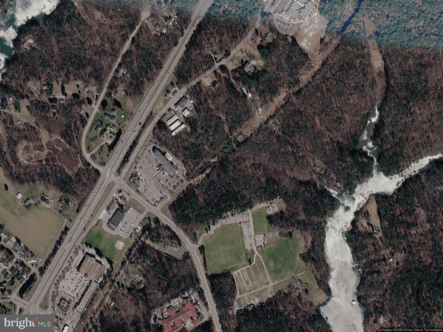 12890 H G Trueman Road Dowell, MD 20629 - Photo 2 of 2 a aerial view of a house with a yard