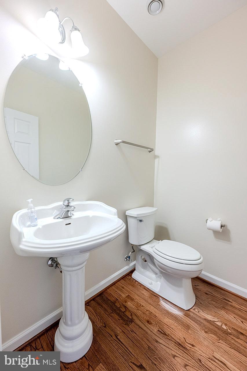 230 West Ridge Court Warrenton, VA 20186 - Photo 21 of 44 a bathroom with a sink toilet and a mirror