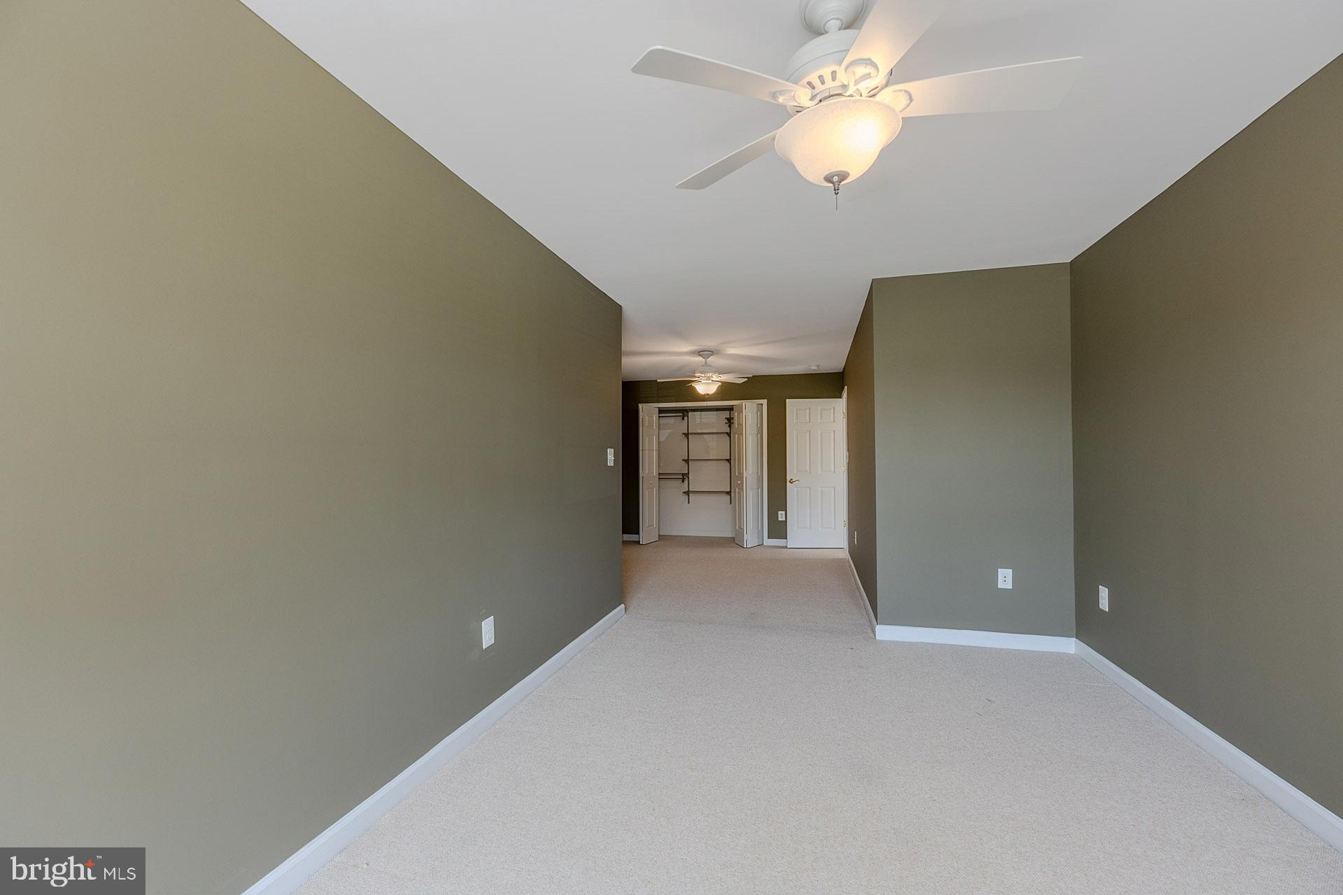 230 West Ridge Court Warrenton, VA 20186 - Photo 28 of 44 a view of a livingroom with a ceiling fan and window